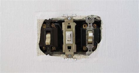 fixing old light switch metal box spring|fixing a loose light switch.